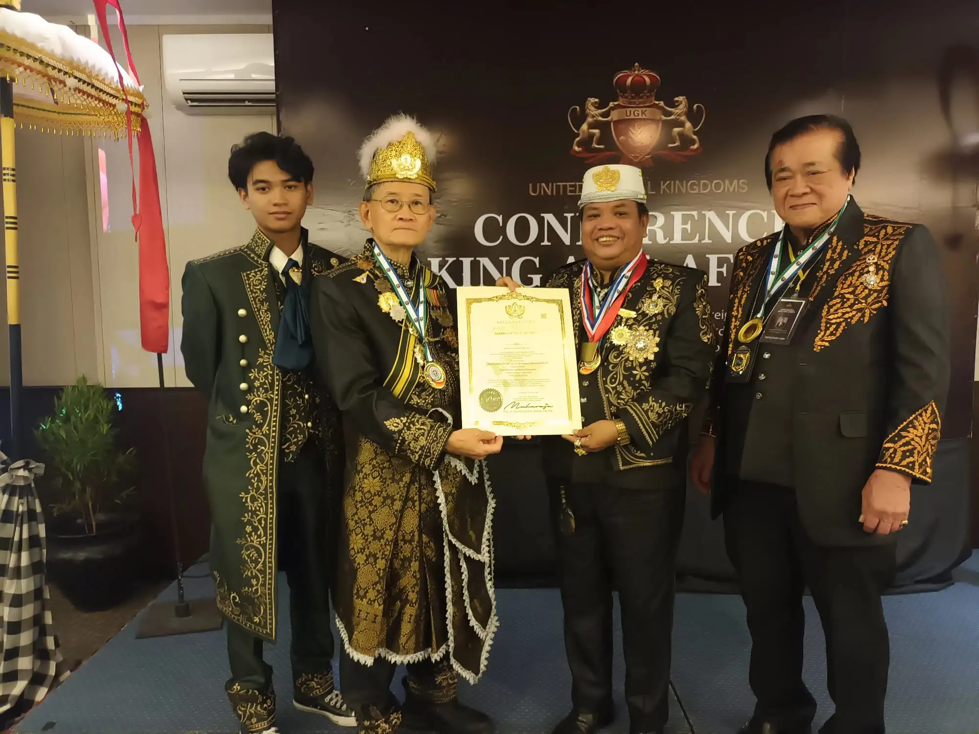 H.R.M. King Tan Sri Gen. GM Prof. Dato' Seri Dr. Sumphand Rathaphattaya, King of Foreign Affairs of the Kingdom of Kutai Mulawarman, was awarded the royal title of Tan Sri on June 29, 2026, in Bali.